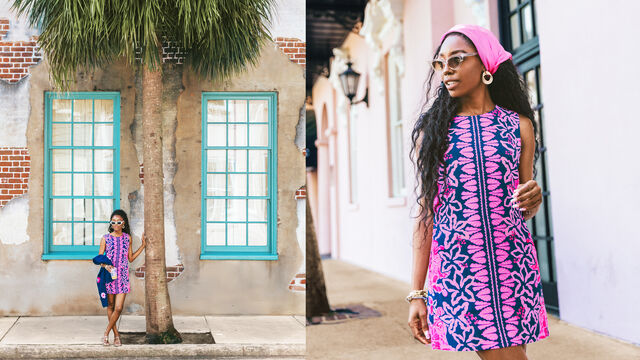 Woman in colorful dress posing on a street in Charleston